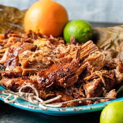   Cochinita Pibil: Rozpływająca się w ustach wieprzowina z bogatym aromatem cytrusów!